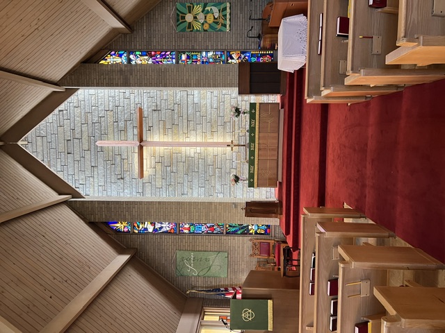 The sanctuary of Lake Villa United Methodist Church, looking toward the altar and cross
