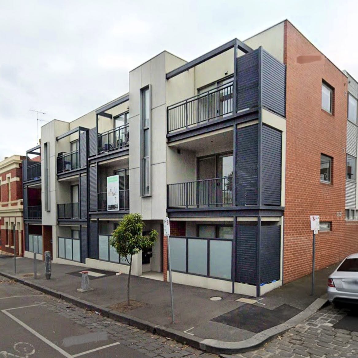 Modern multi-storey strata apartment complex — strata body corporate cleaning services