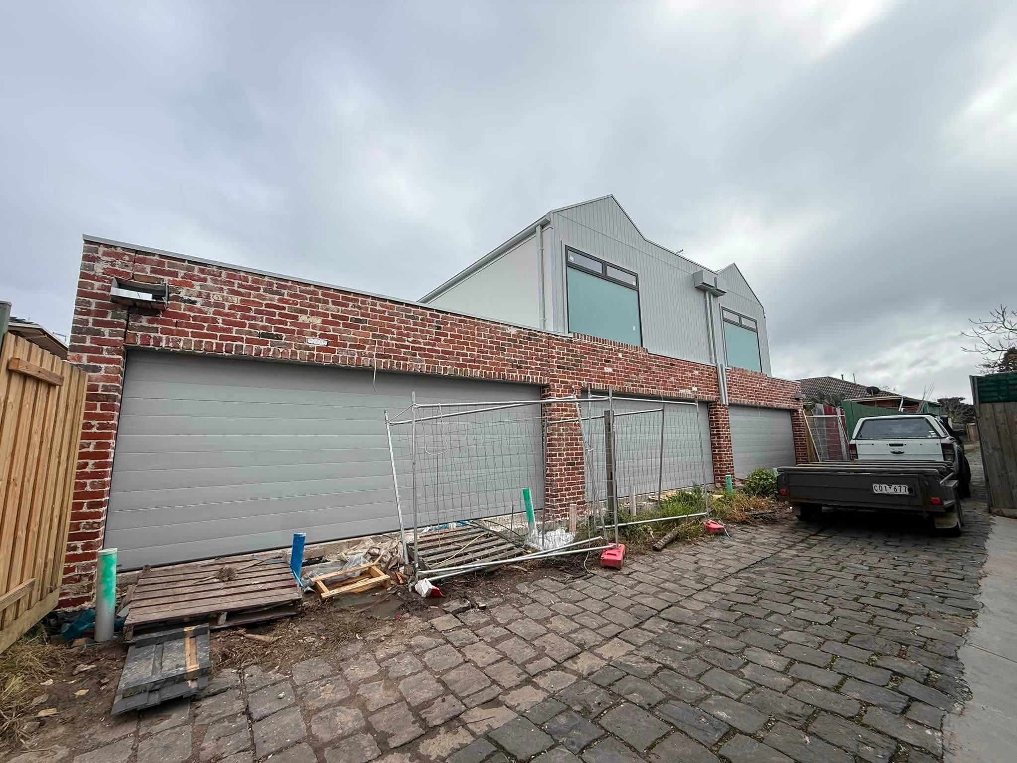 Garage door installation on a brick home