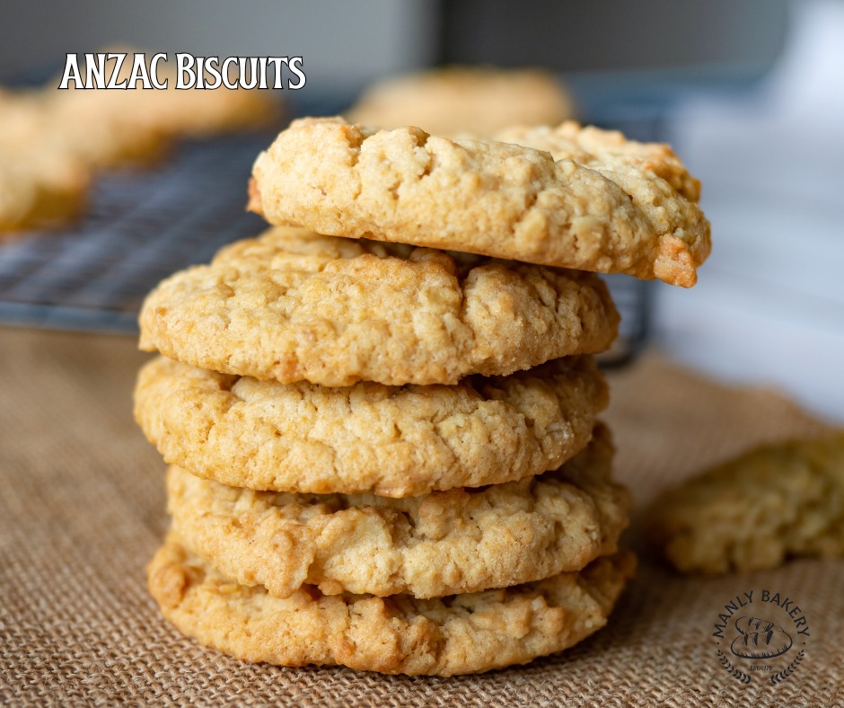 Stack of golden Anzac biscuits on burlap at Manly Bakery