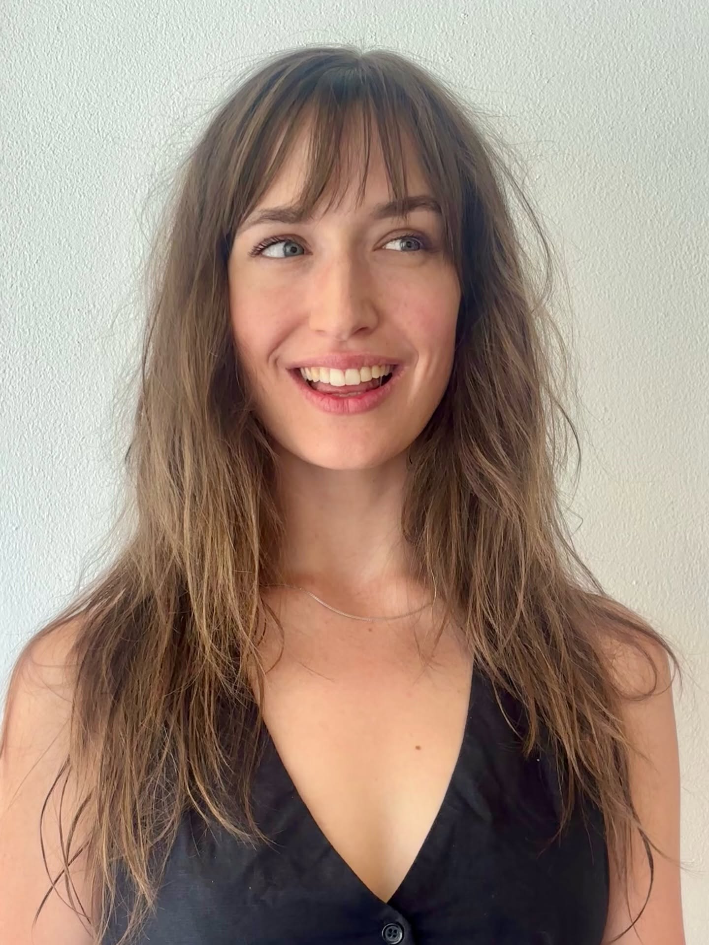 Long layered cut with a wispy fringe