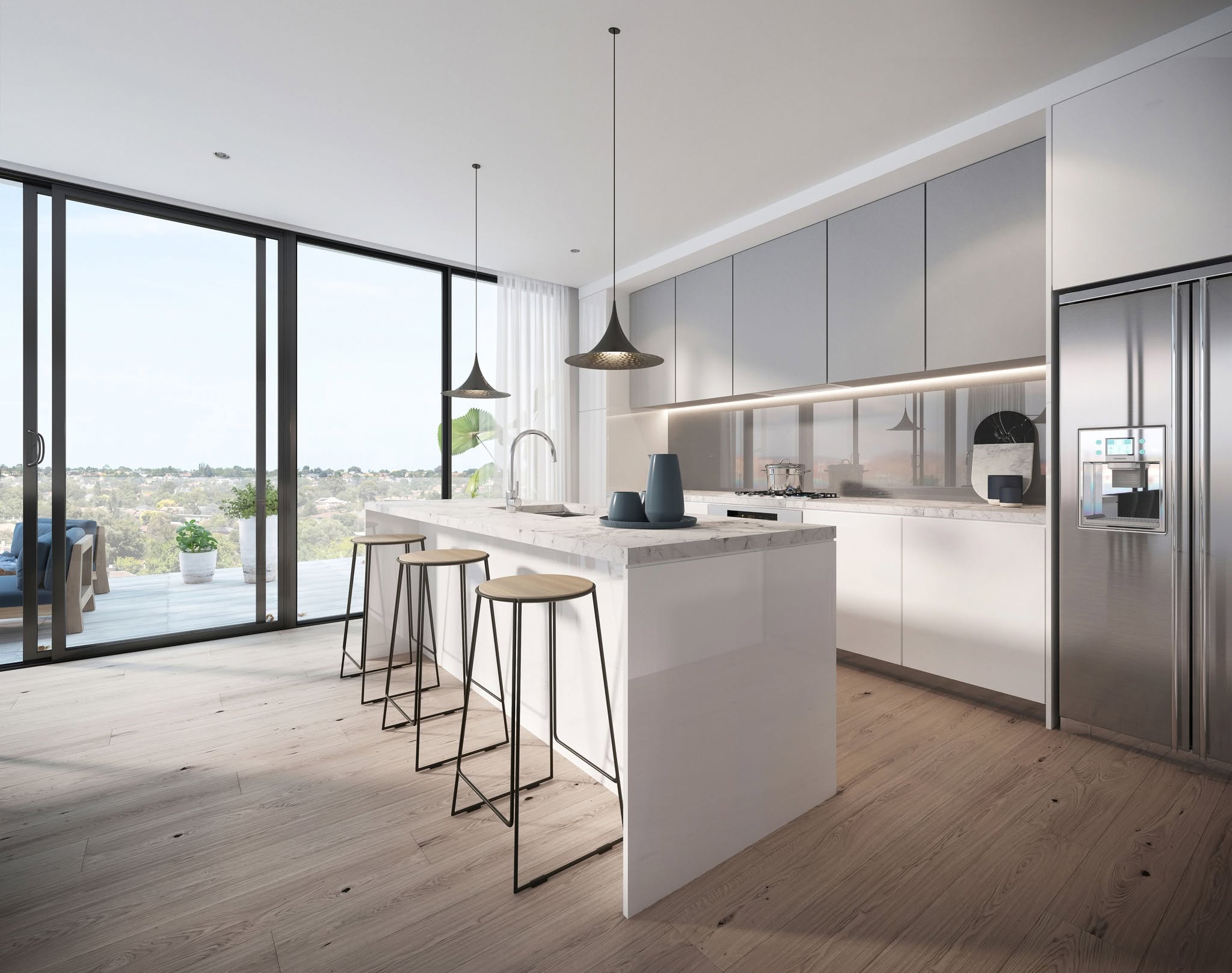 Modern open-plan kitchen with marble island and city views in a Philidor apartment development