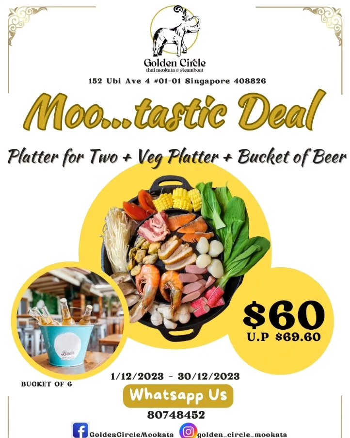 Top-down mookata platter showing full spread of seafood and vegetables with a bucket of beer alongside
