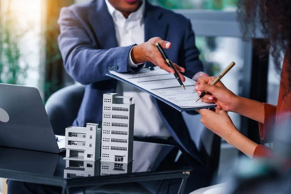 Financial consultants reviewing documents together, representing cashflow and tax planning