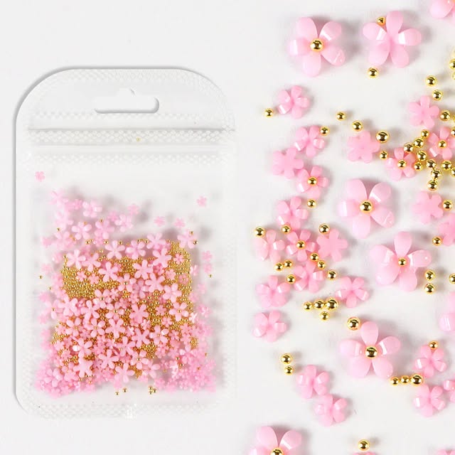 Pink flower nail art charms with gold beads