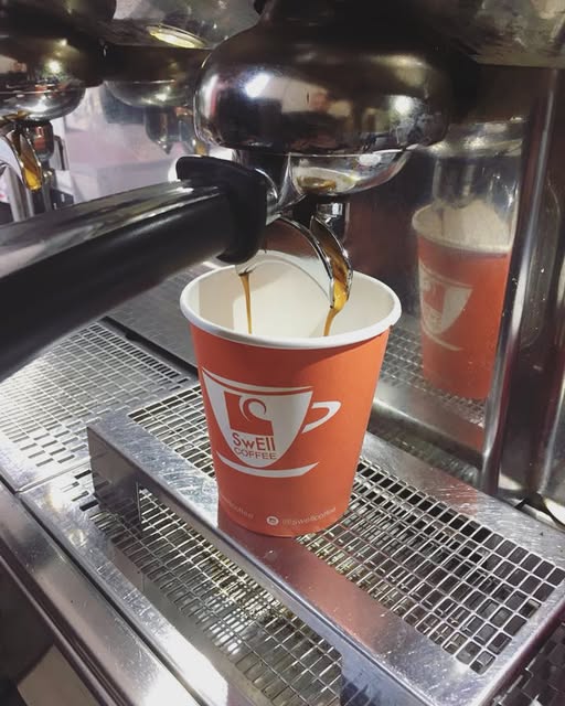 Espresso machine pouring a fresh coffee shot at Tuna Blue Cafe