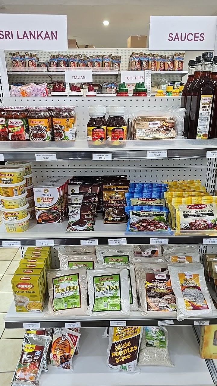 Shelves of Sri Lankan grocery staples and sauces inside Fawkner Fresh