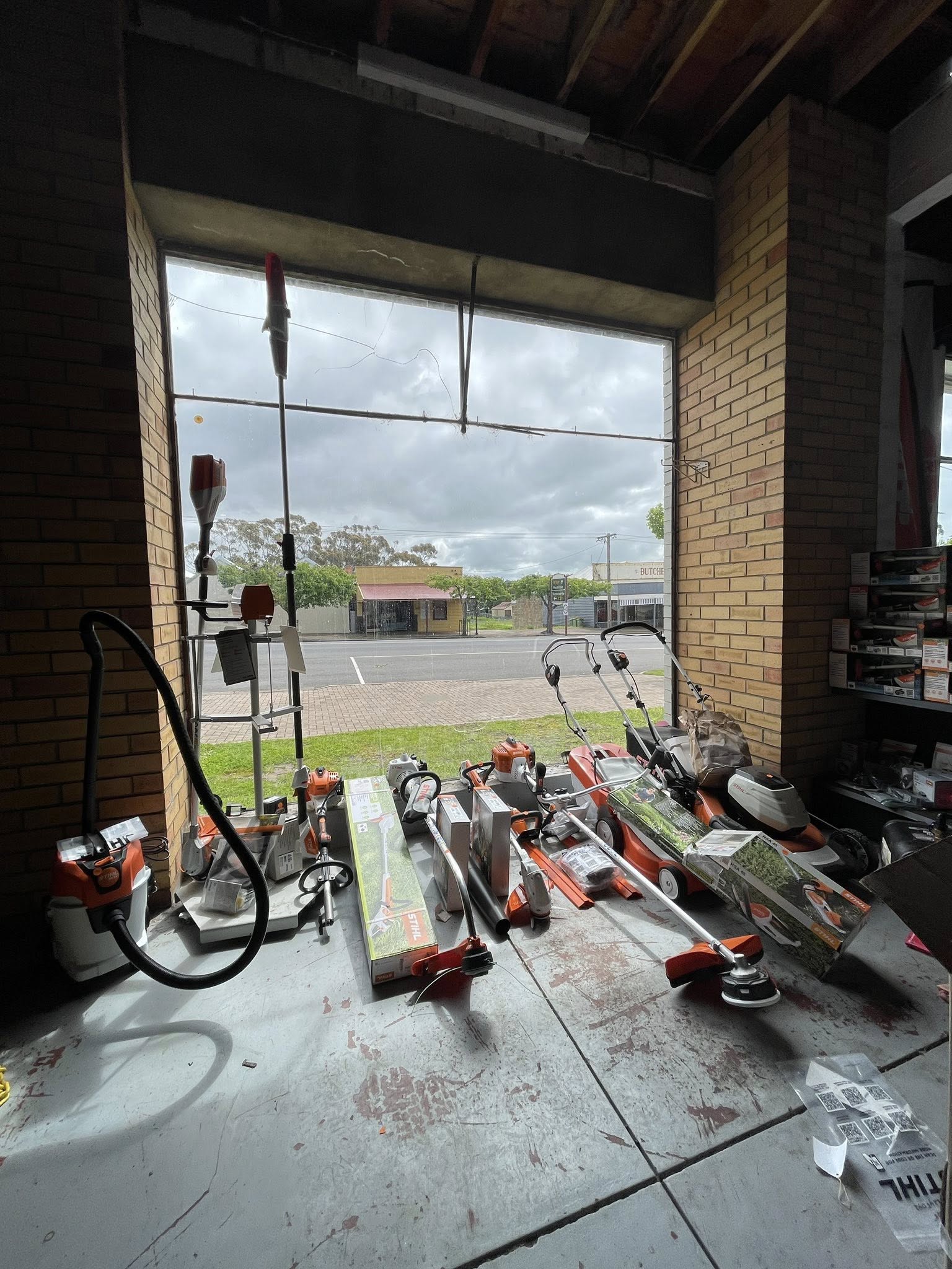 Inside the Casterton Auto Repairs workshop — equipment and tools with a view of McPherson Street