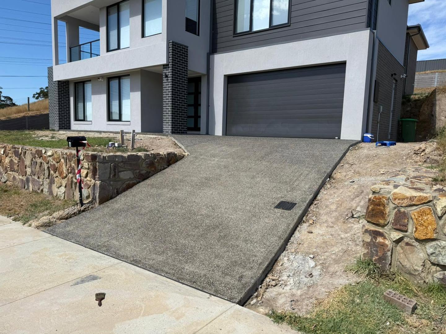 Exposed aggregate driveway on modern Melbourne home