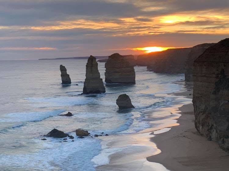 Sunset view of the Twelve Apostles limestone stacks along the Great Ocean Road