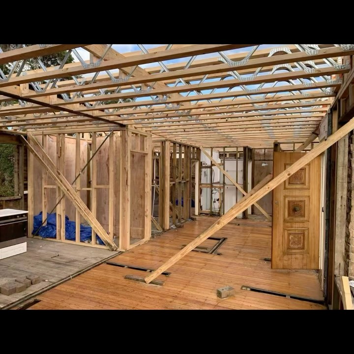 Interior timber roof framing and floor structure during construction of a Tekcon Constructions home