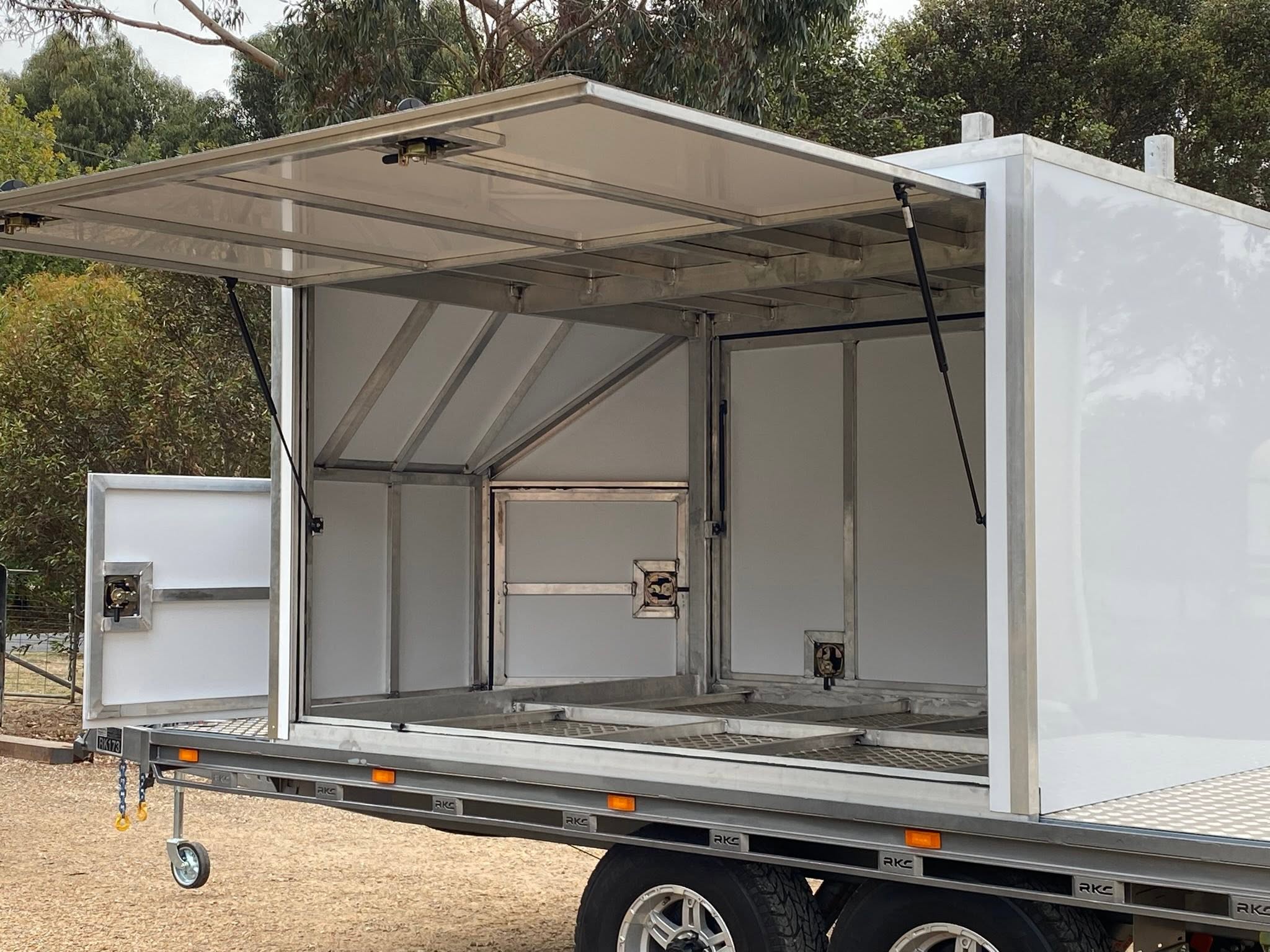 Horse float interior showing open sides and aluminium fitout