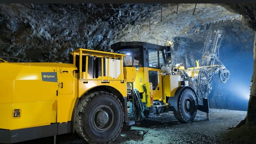 Underground Epiroc loader in a mine tunnel — diesel-powered heavy machinery