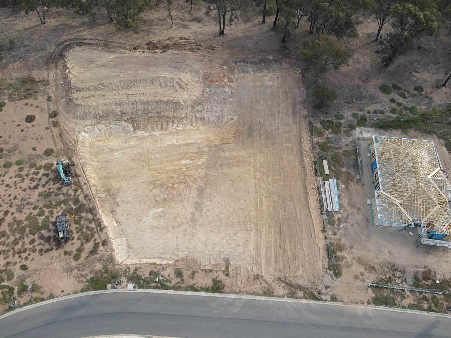 Aerial view of a completed site cut and building pad earthworks project