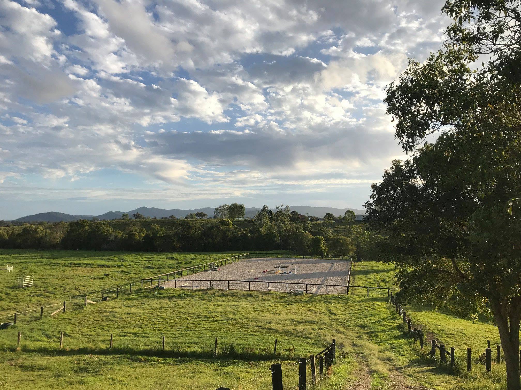 65m x 30m sand arena with show jumps and mountain views at Dayboro Valley Agistment