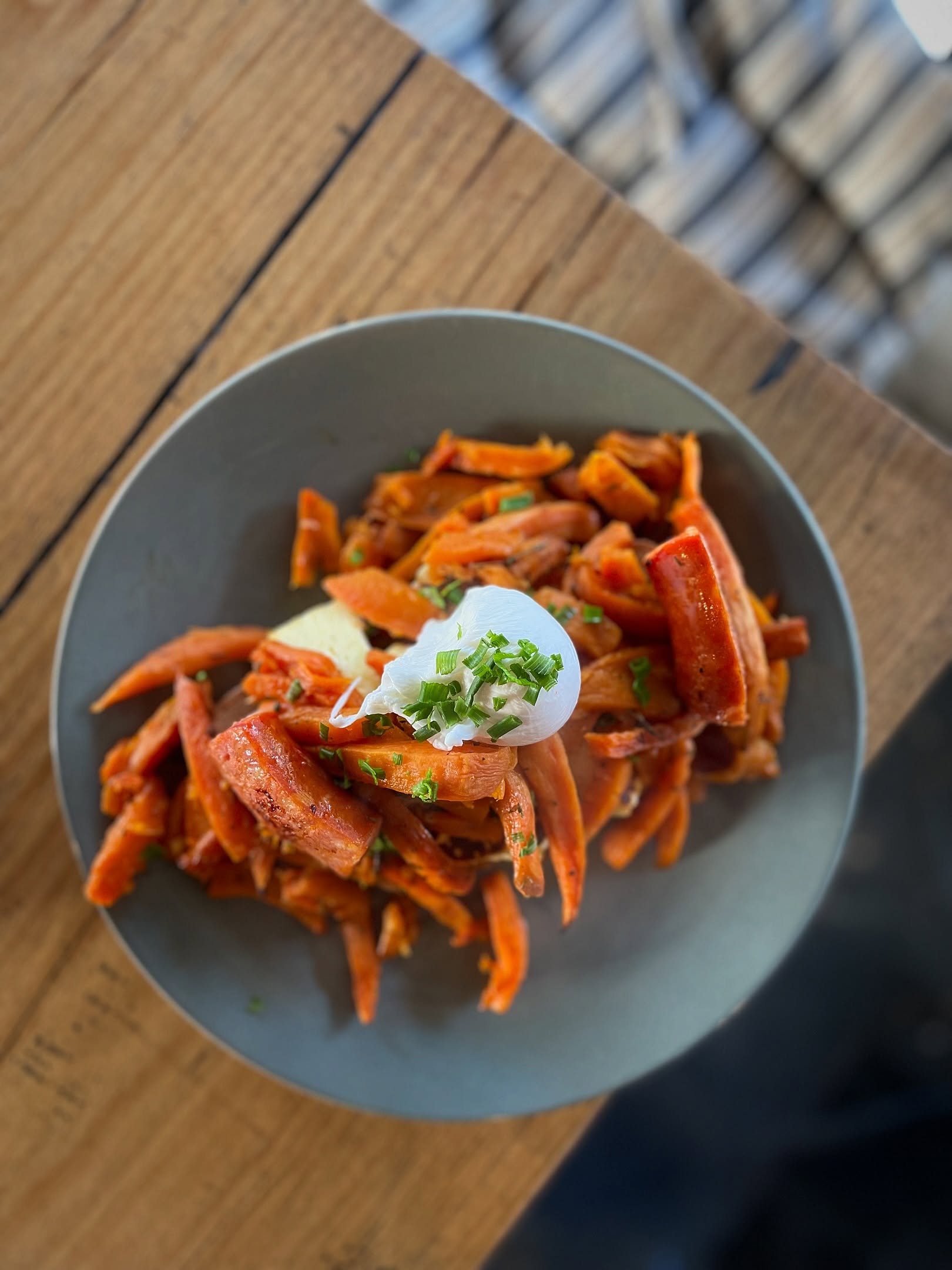 Roasted sweet potato brunch dish with a poached egg and chives, served at Station Street Trading Co.