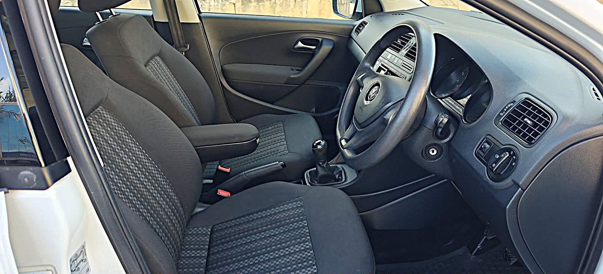 Clean VW interior showing quality front seats and steering wheel