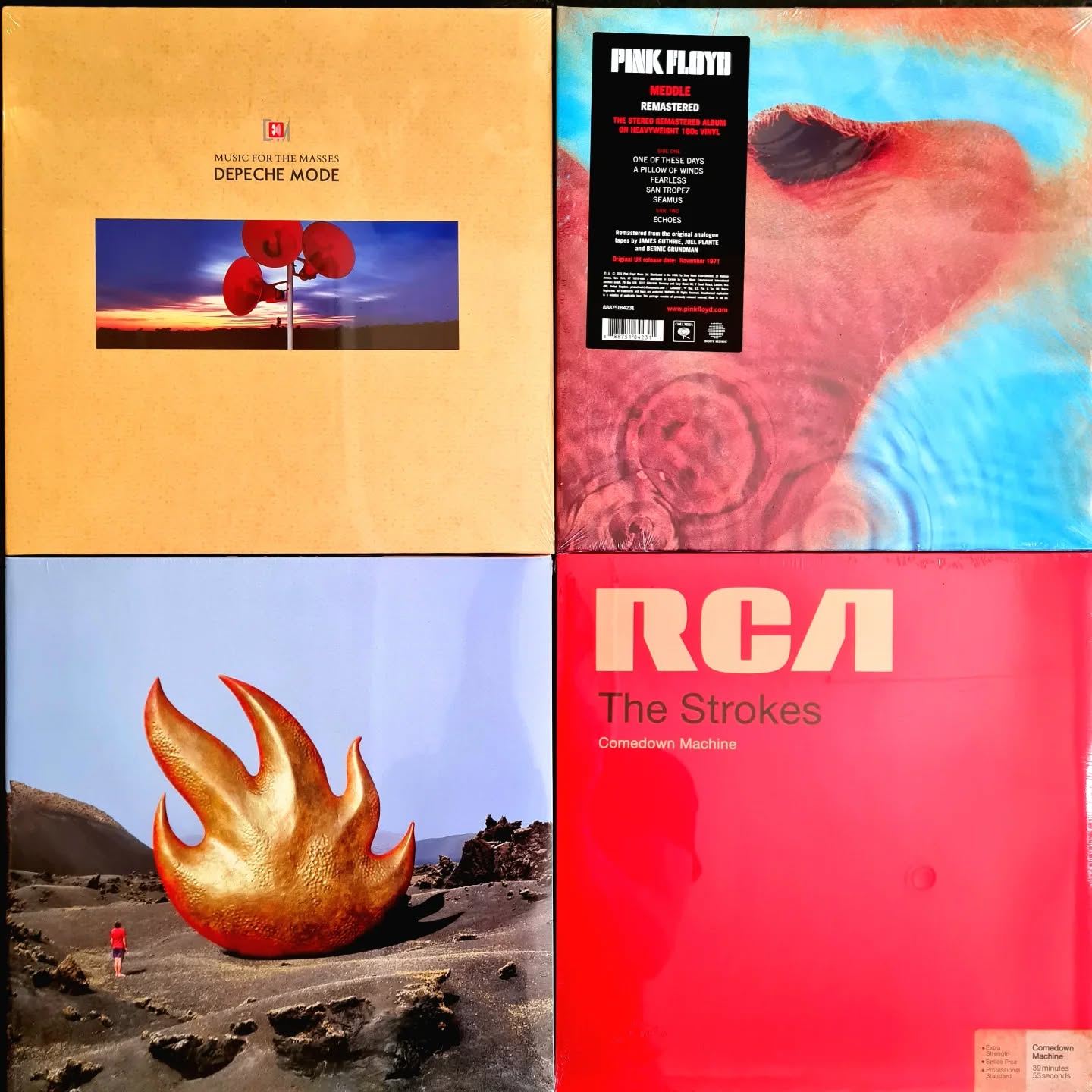 Selection of vinyl records including Depeche Mode, Pink Floyd, ACDC and The Strokes