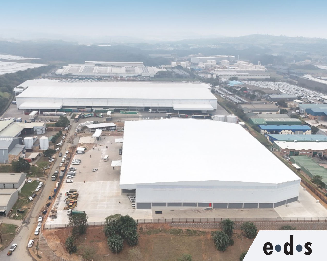 Aerial view of large industrial warehouse complex