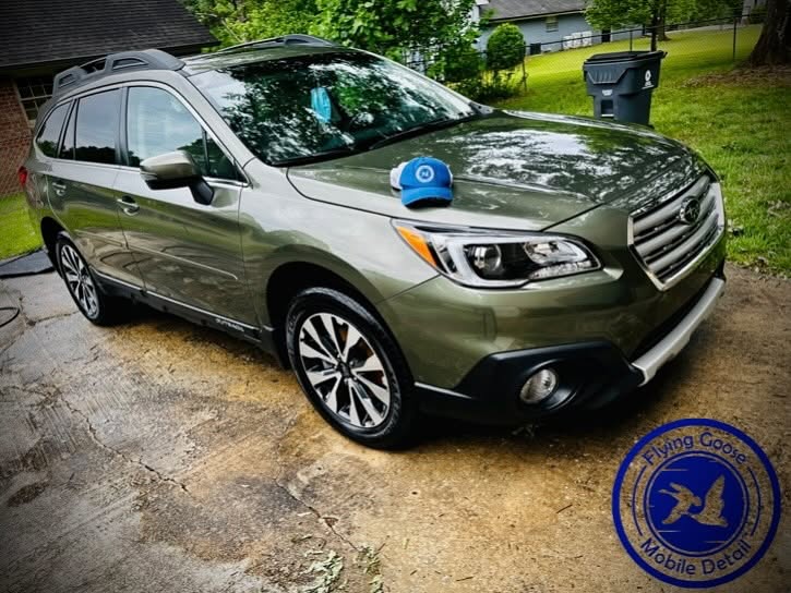 Subaru Outback with gleaming paint after a professional wash