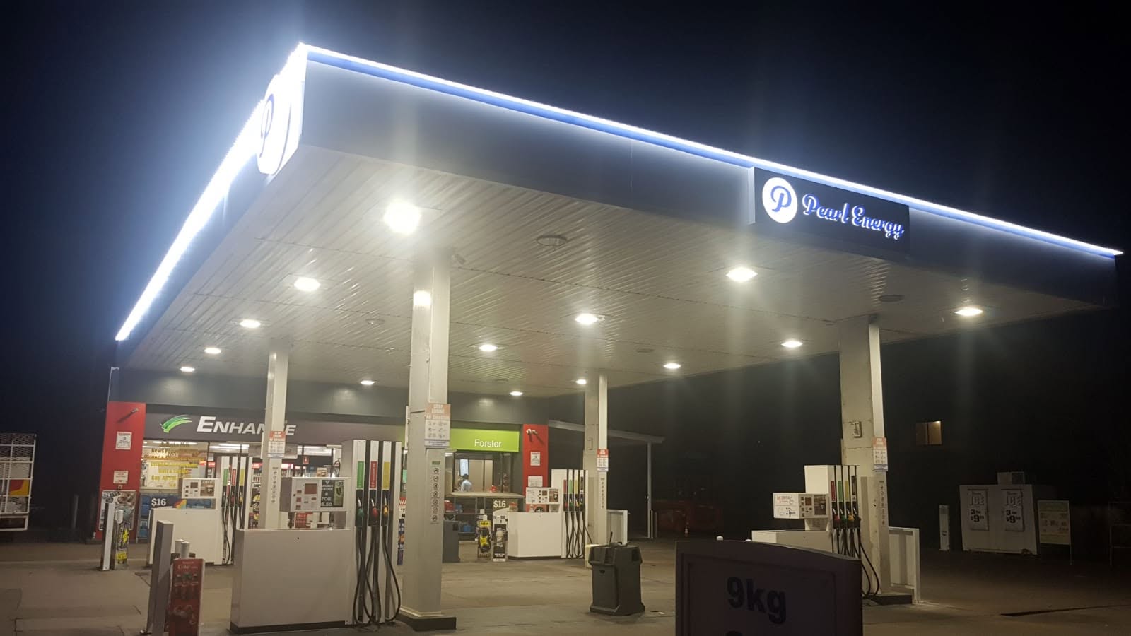 Pearl Energy station exterior at night with bright lighting