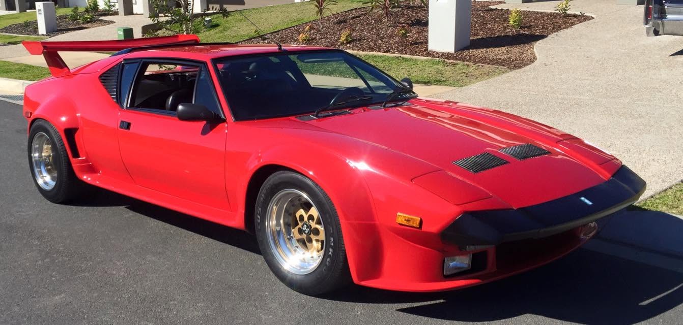 Red De Tomaso Pantera-style exotic sports car — specialist exotic vehicle work