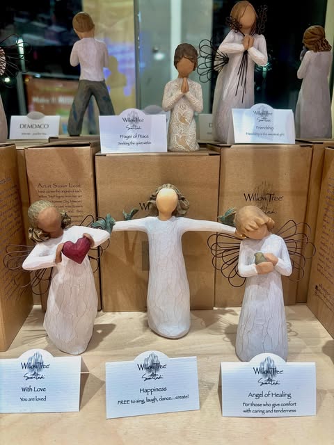 Willow Tree angel figurines and gift items on display at The News Agent Cards & Gifts