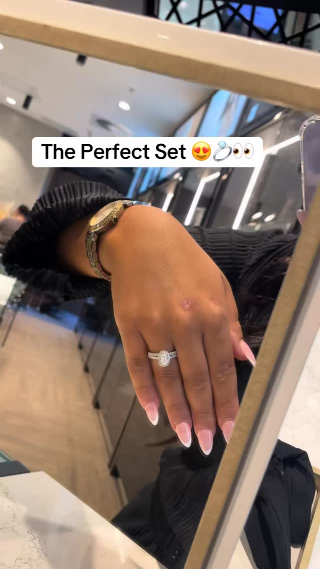 Oval halo diamond engagement ring with gold watch