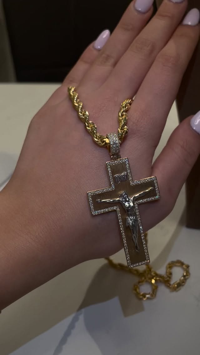 Gold and diamond crucifix cross pendant necklace on rope chain