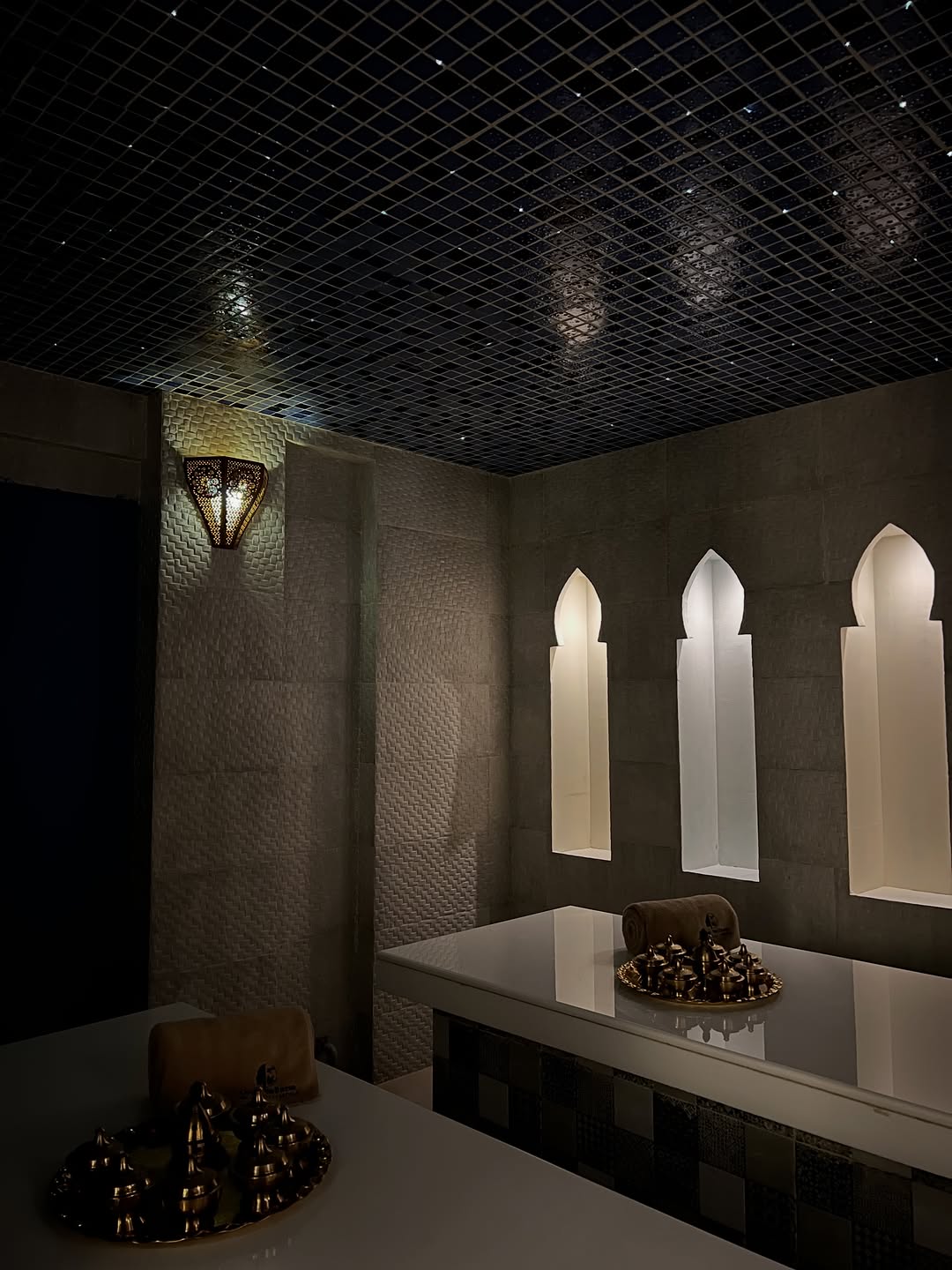 Serene Moroccan-style spa treatment room at Orion Massage Centre