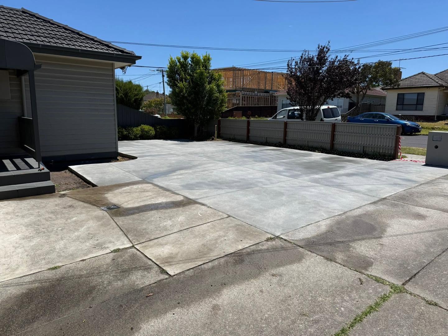 Fresh plain concrete driveway installation in Melbourne suburbs