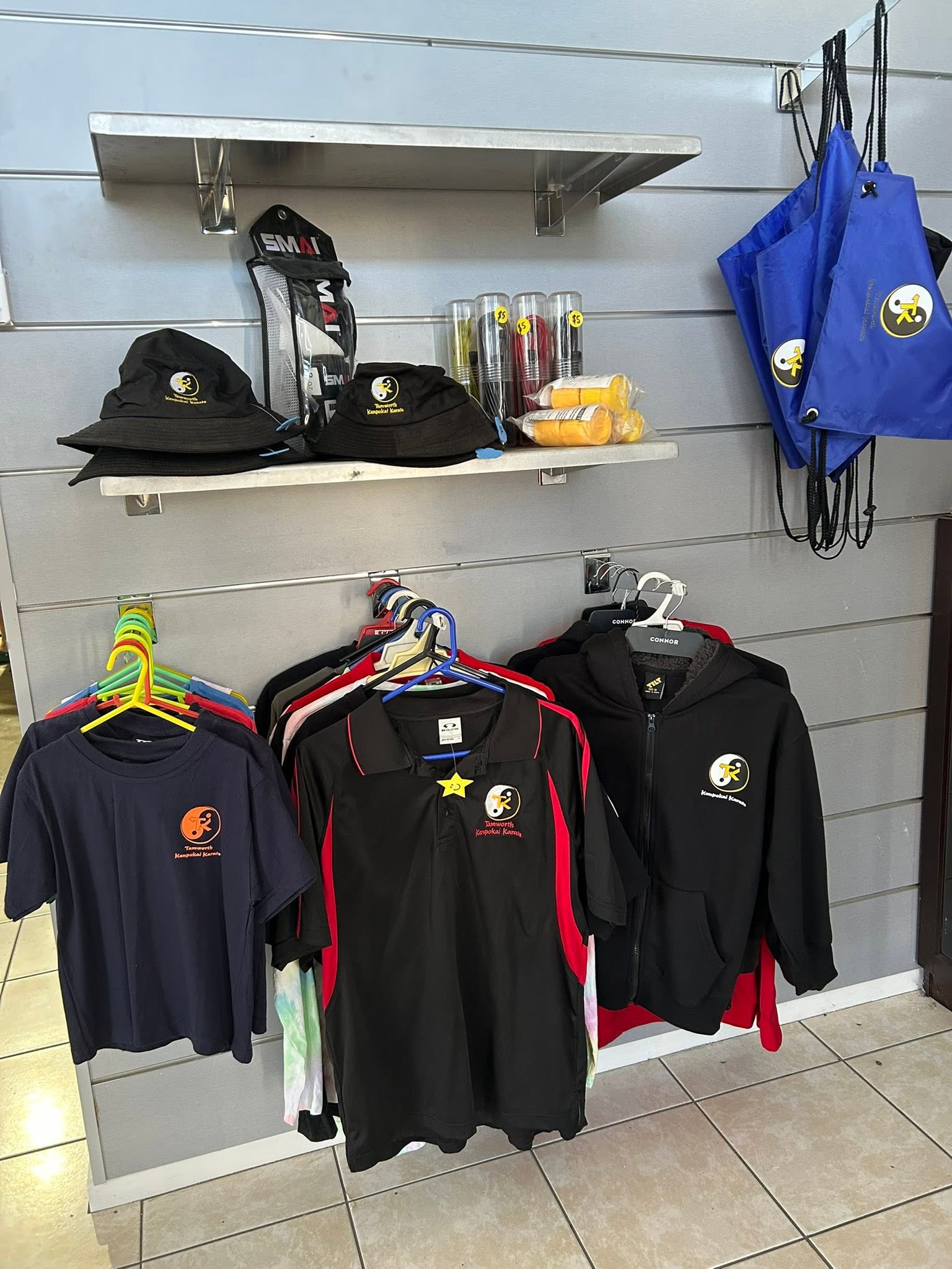 Tamworth Kenpokai Karate branded uniforms, polo shirts, hoodies and caps displayed at the club