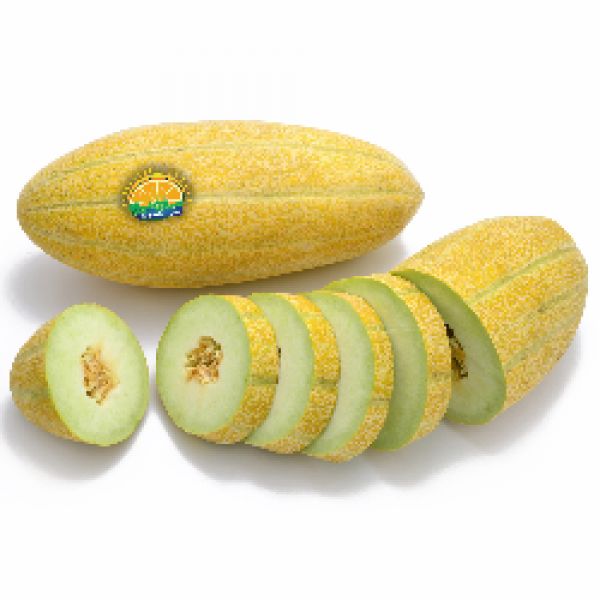 Sliced fresh yellow melon showing green flesh