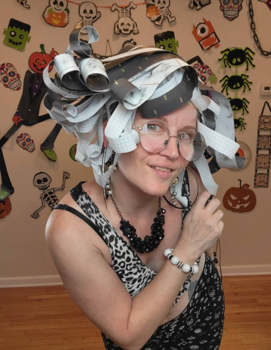 Donna Marie Milligan wearing a graph paper wig with visible grid paper curls.