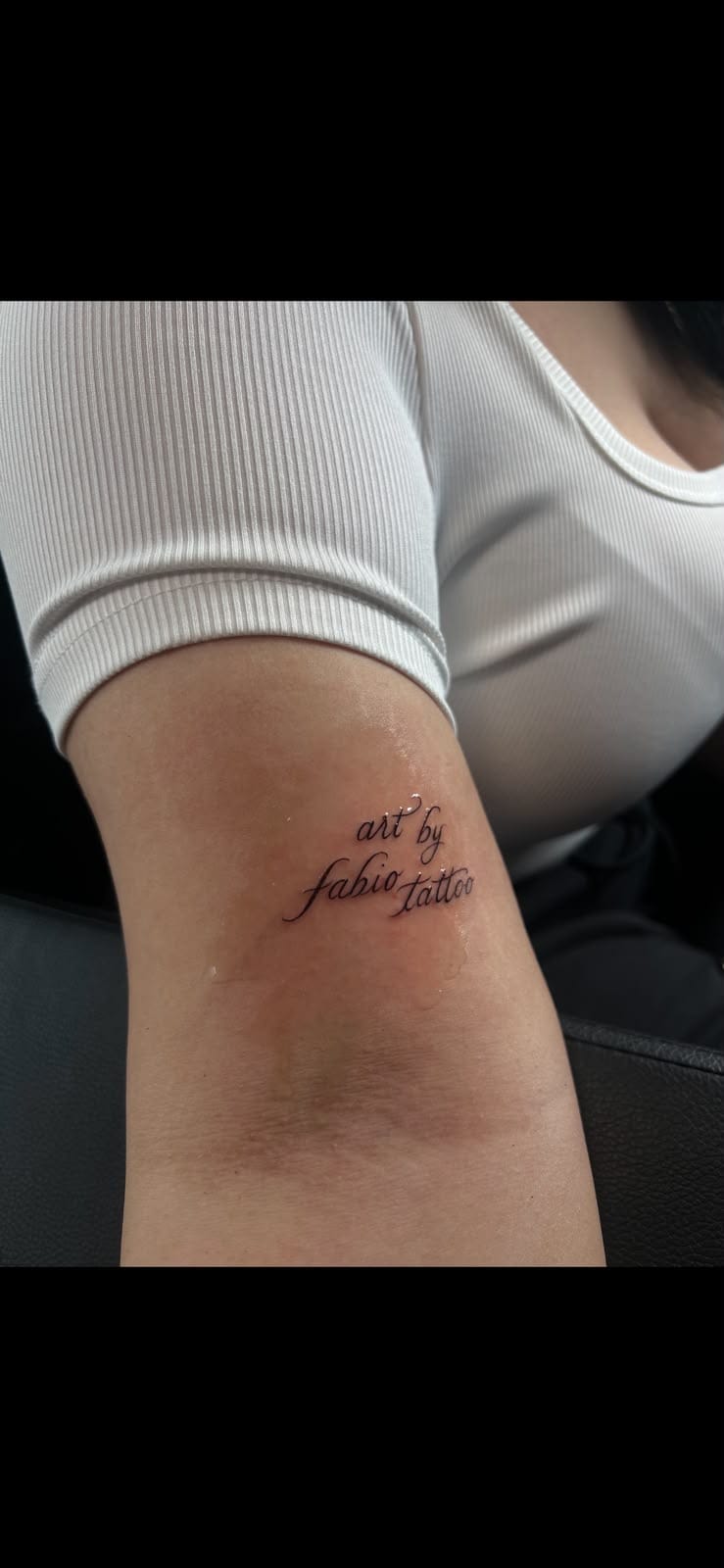 Lettering art by fabio tattoo Kursivschrift am Unterarm