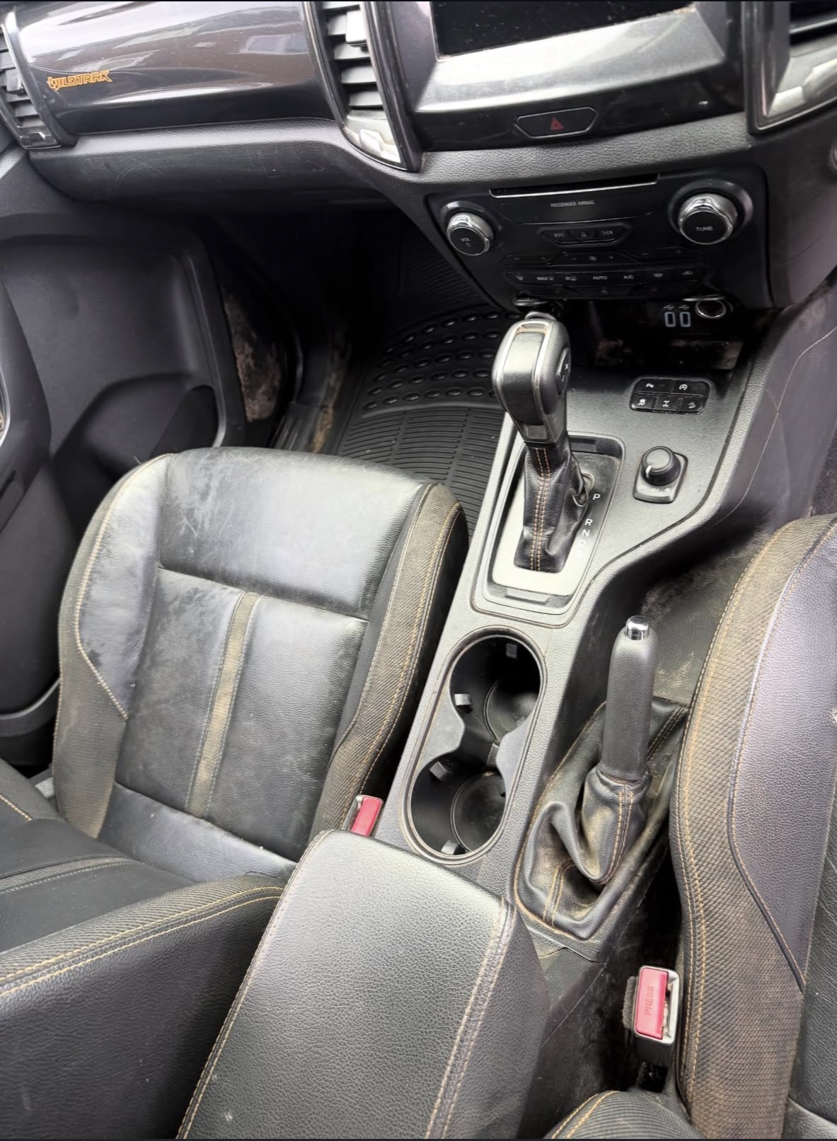 Car interior before detailing - dirty and dusty
