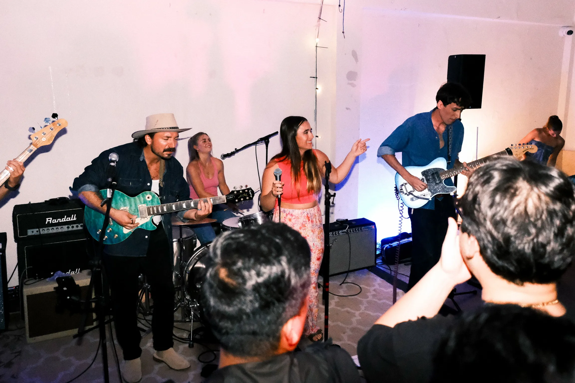 Full band performing live with crowd