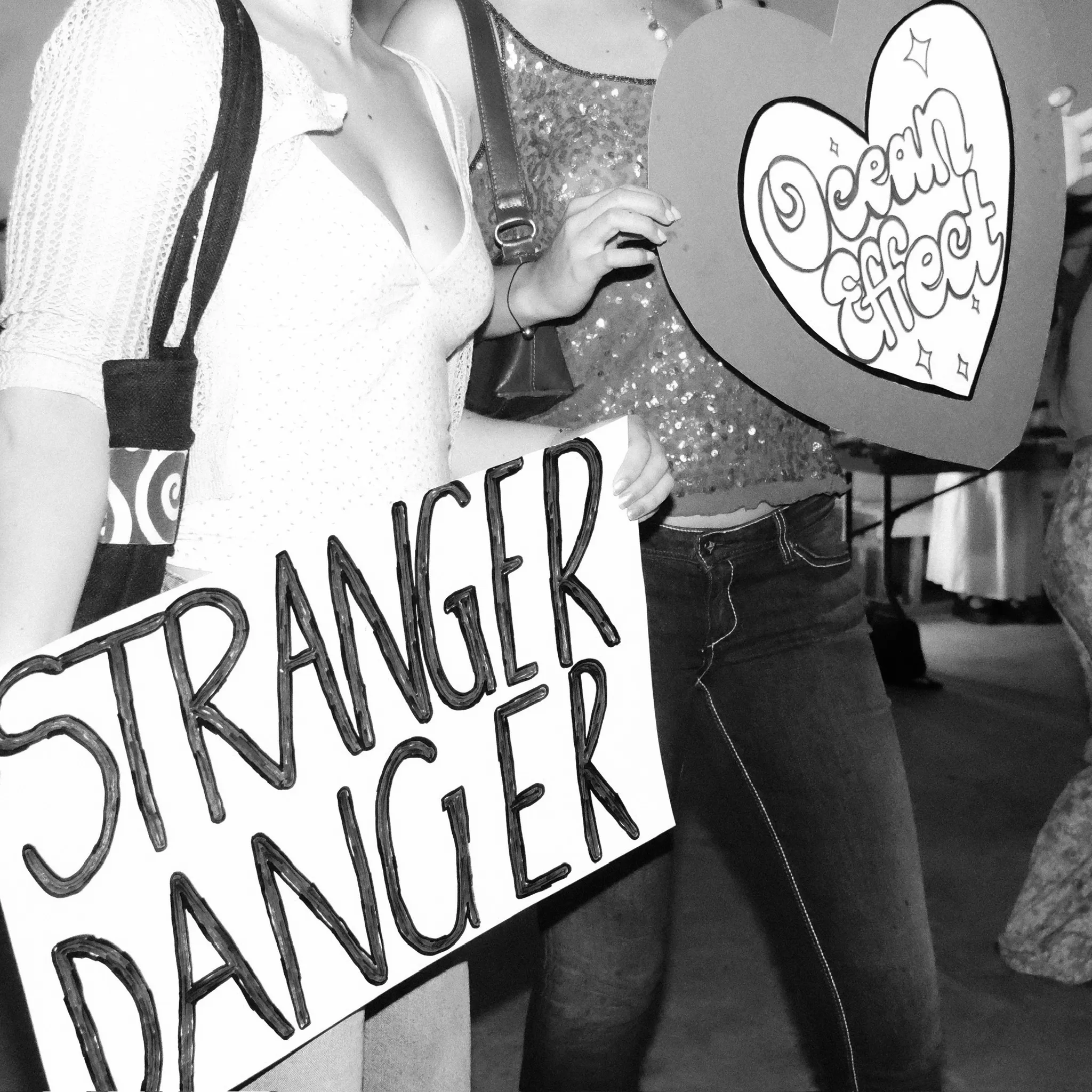 Fans holding Ocean Effect signs