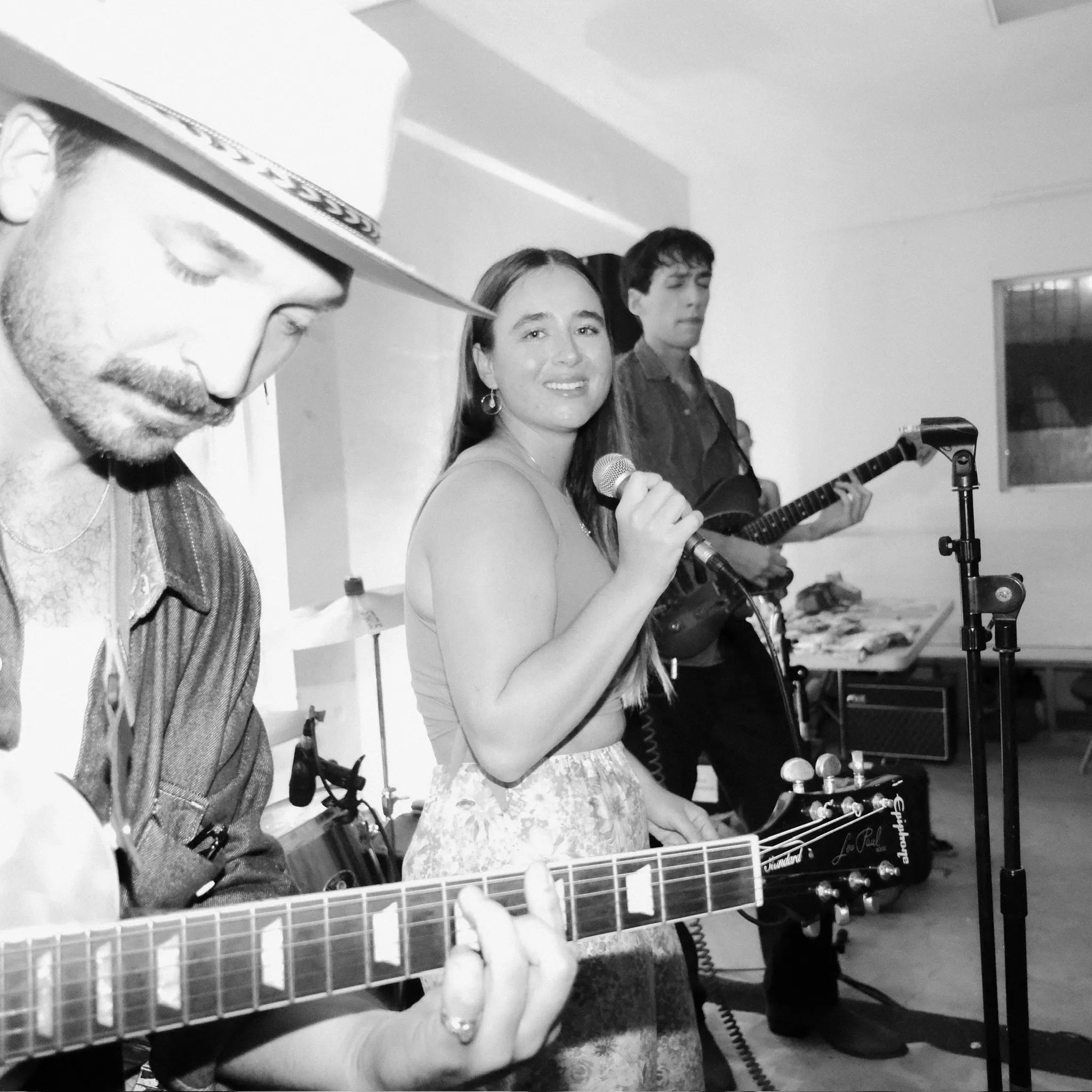 Band performing together on stage