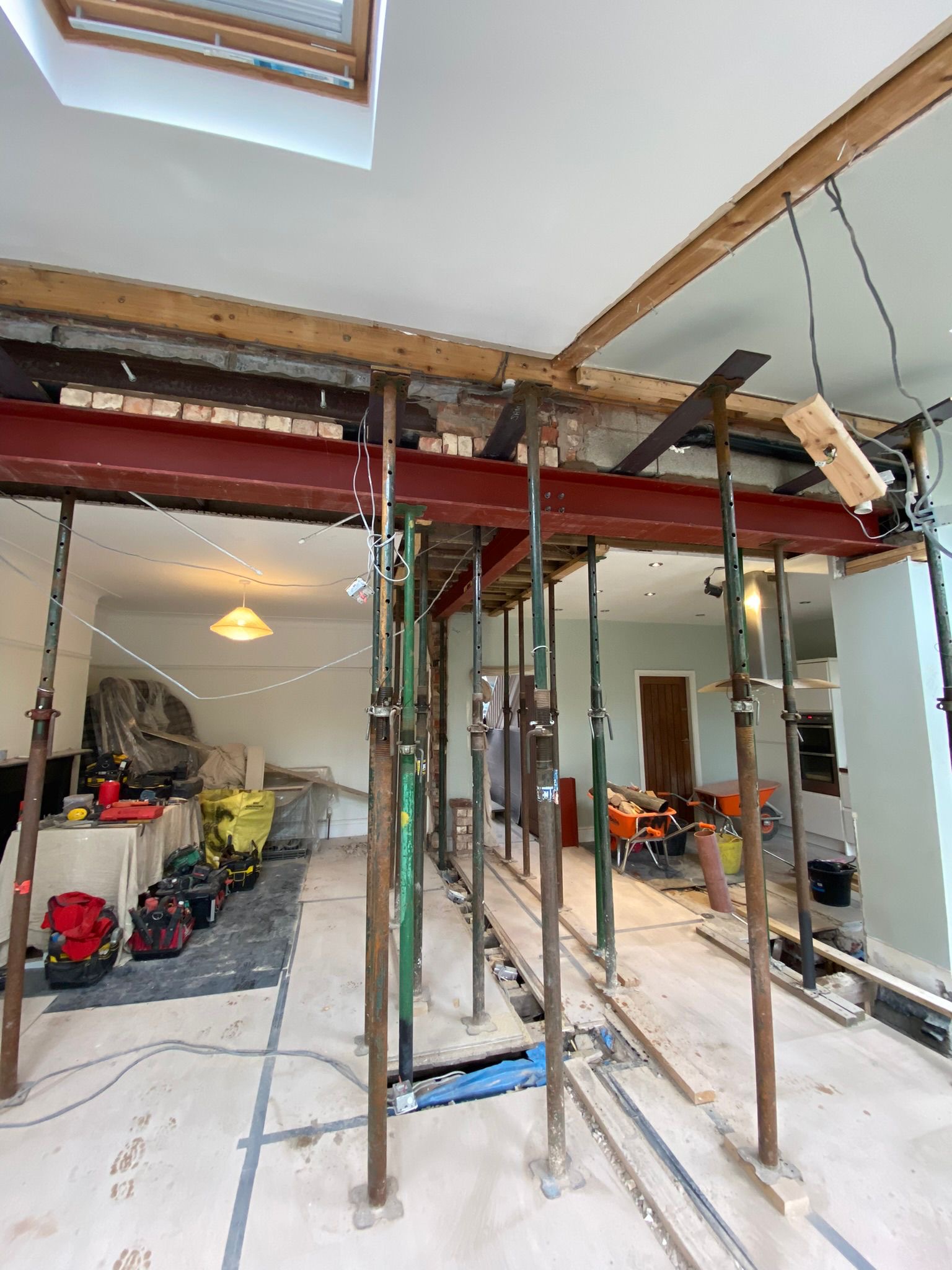 Residential steel beam installation with temporary supports