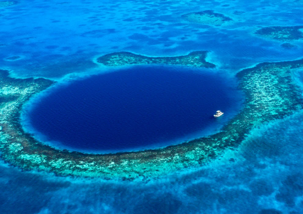 Aerial view of the Great Blue Hole, Belize's famous marine sinkhole