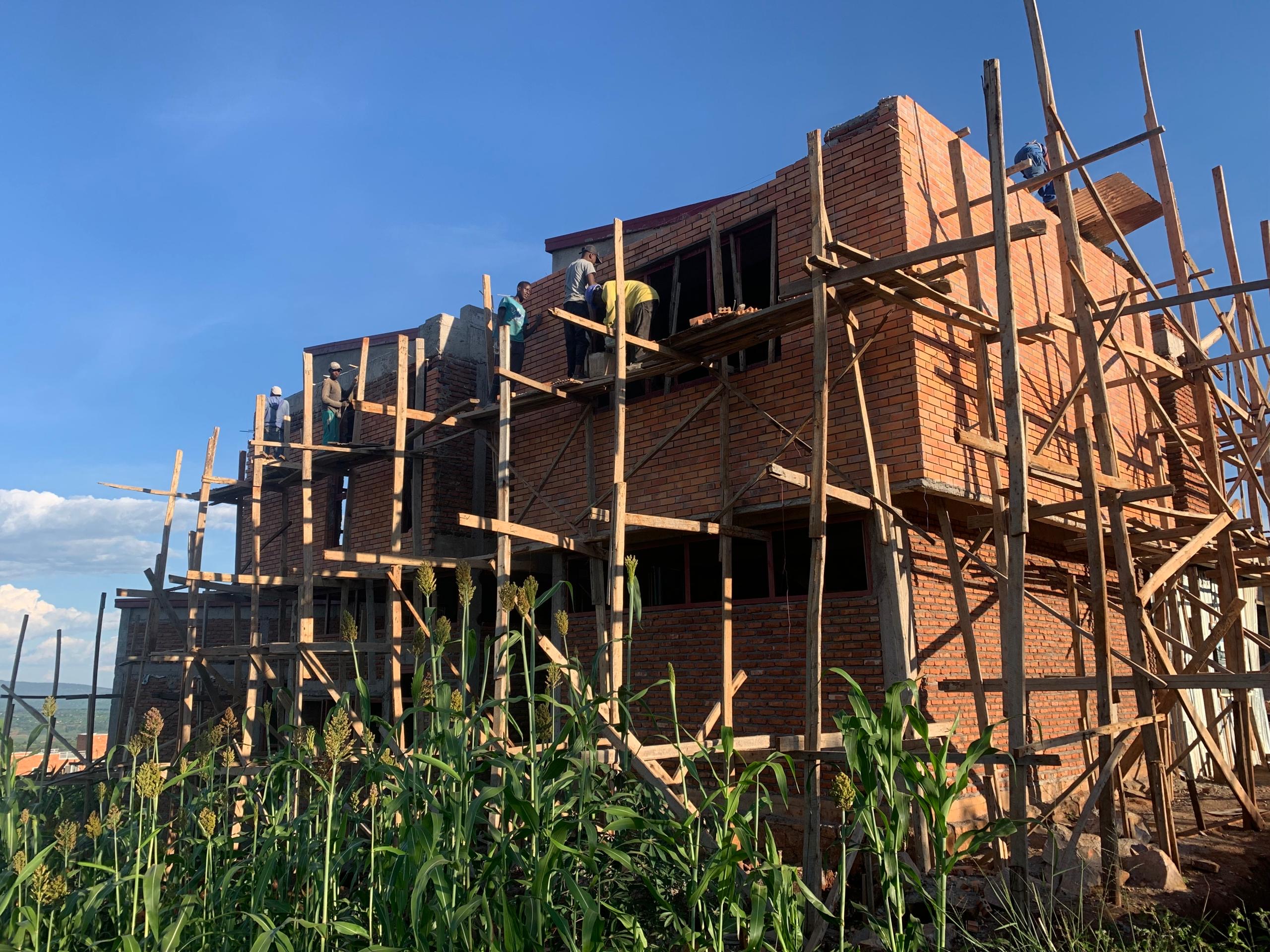 Construction crew working on a masonry structure