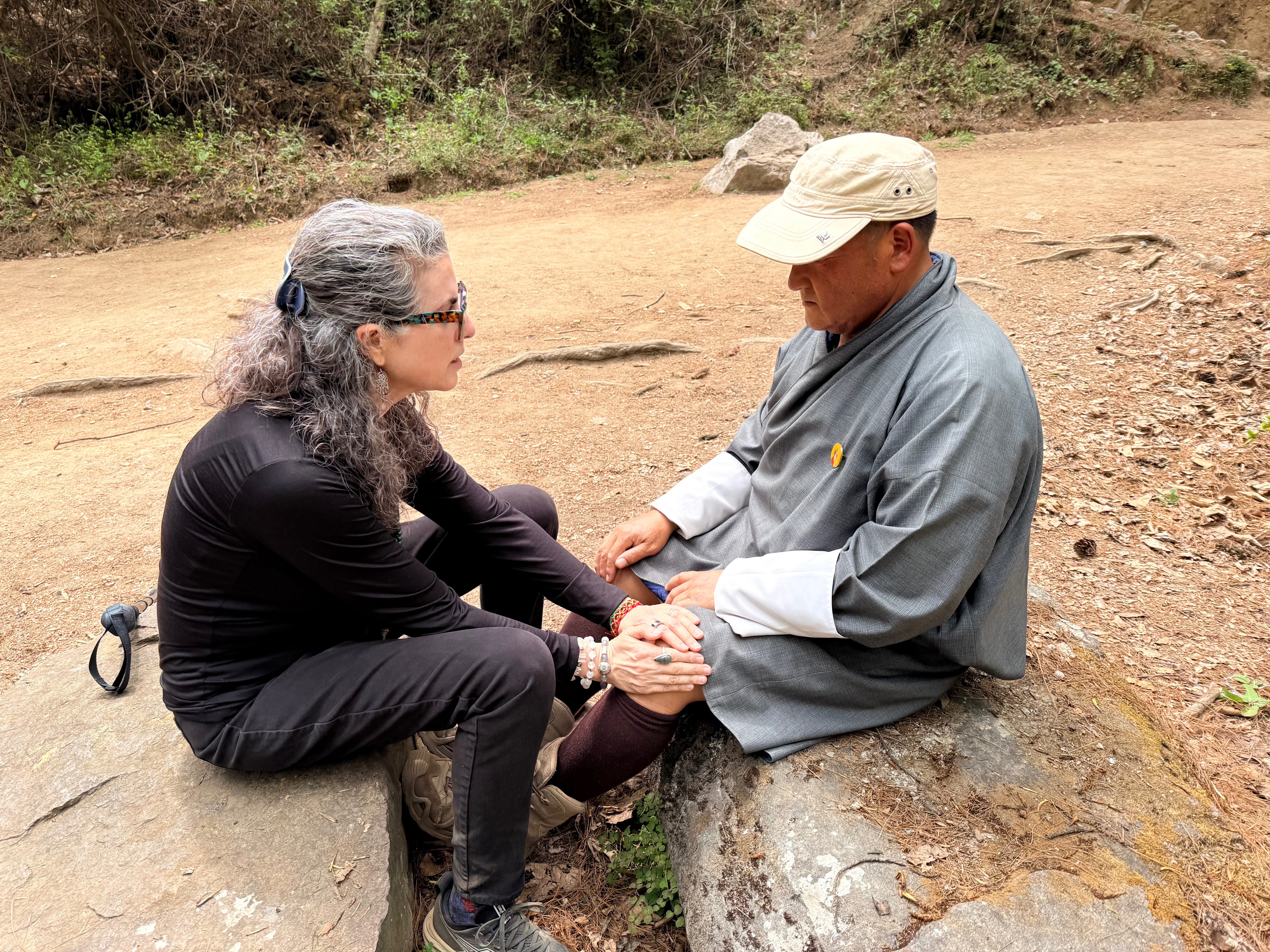 Amy healing Jambay Wangchuk at Tiger's Nest, Bhutan