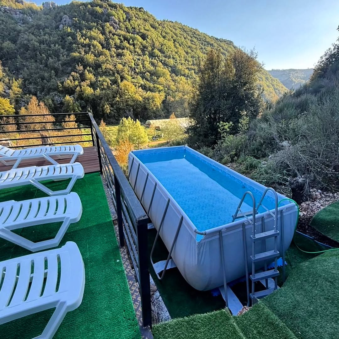 Outdoor pool with mountain backdrop
