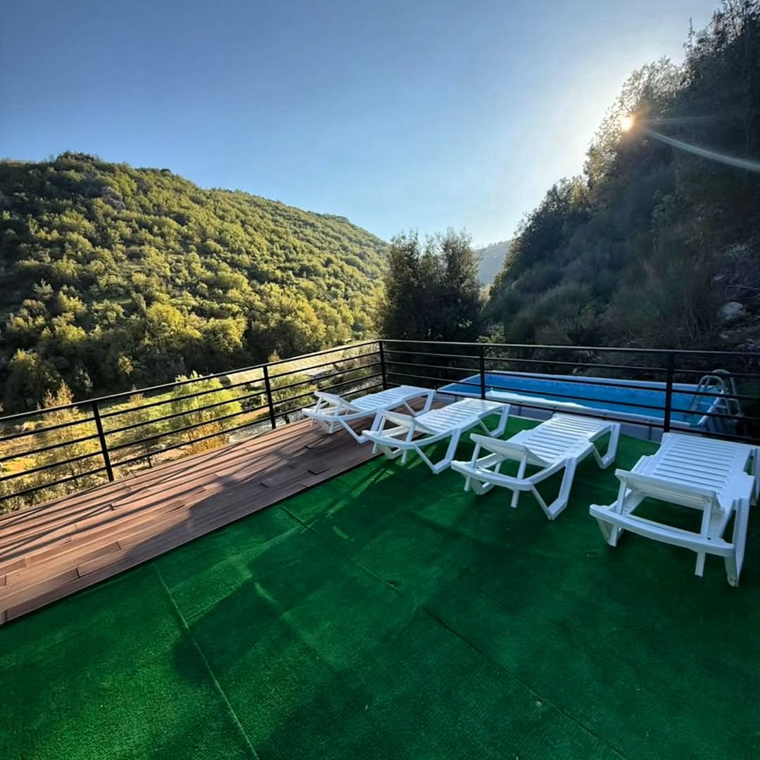 Pool deck with mountain views