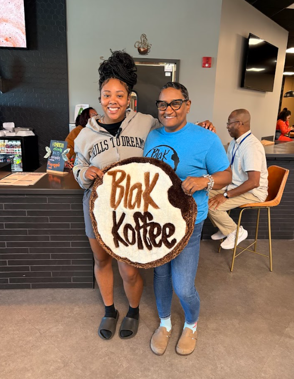 Ronyale Smith with team members at Blak Koffee