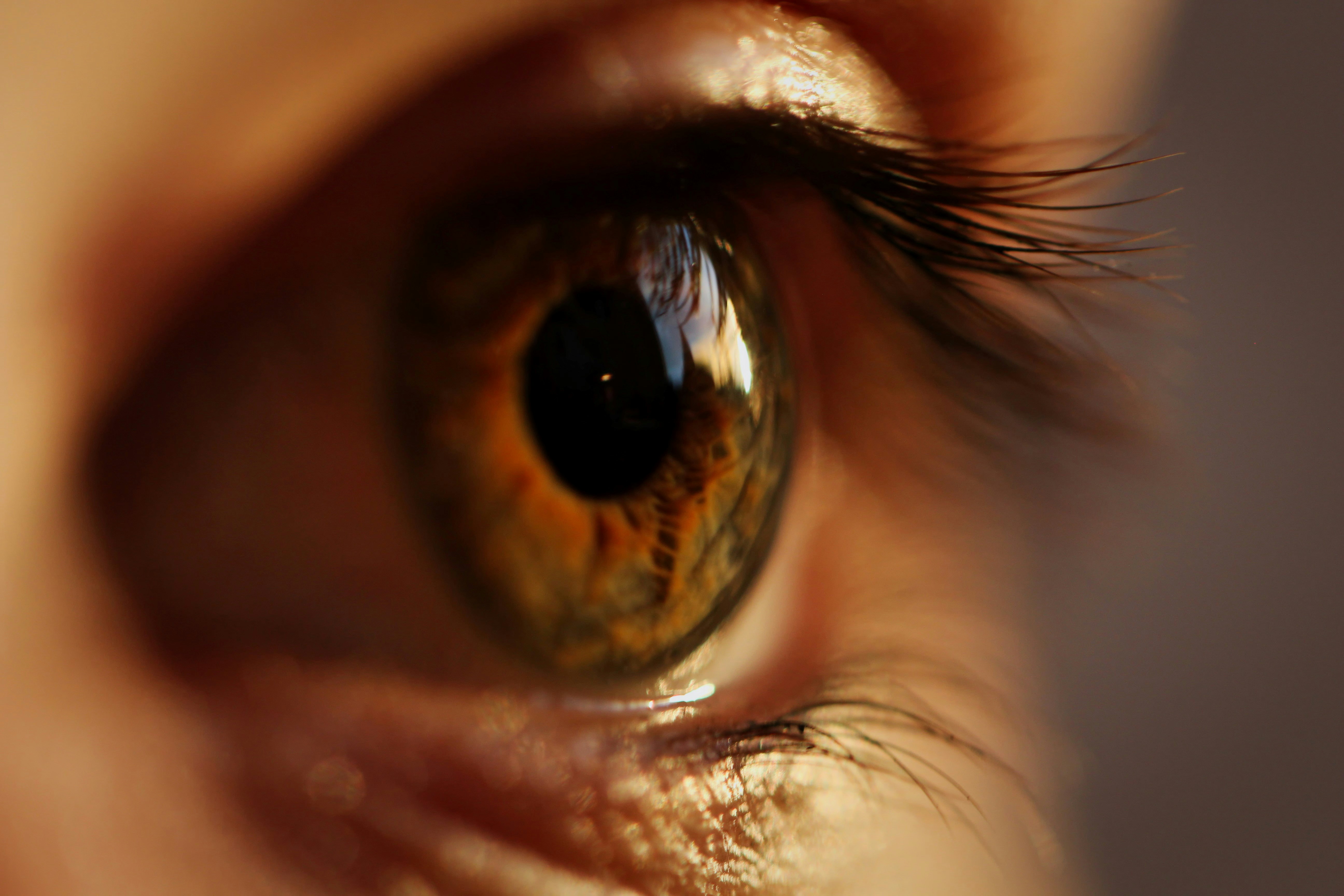 Close-up of an eye showing the impact of blue light