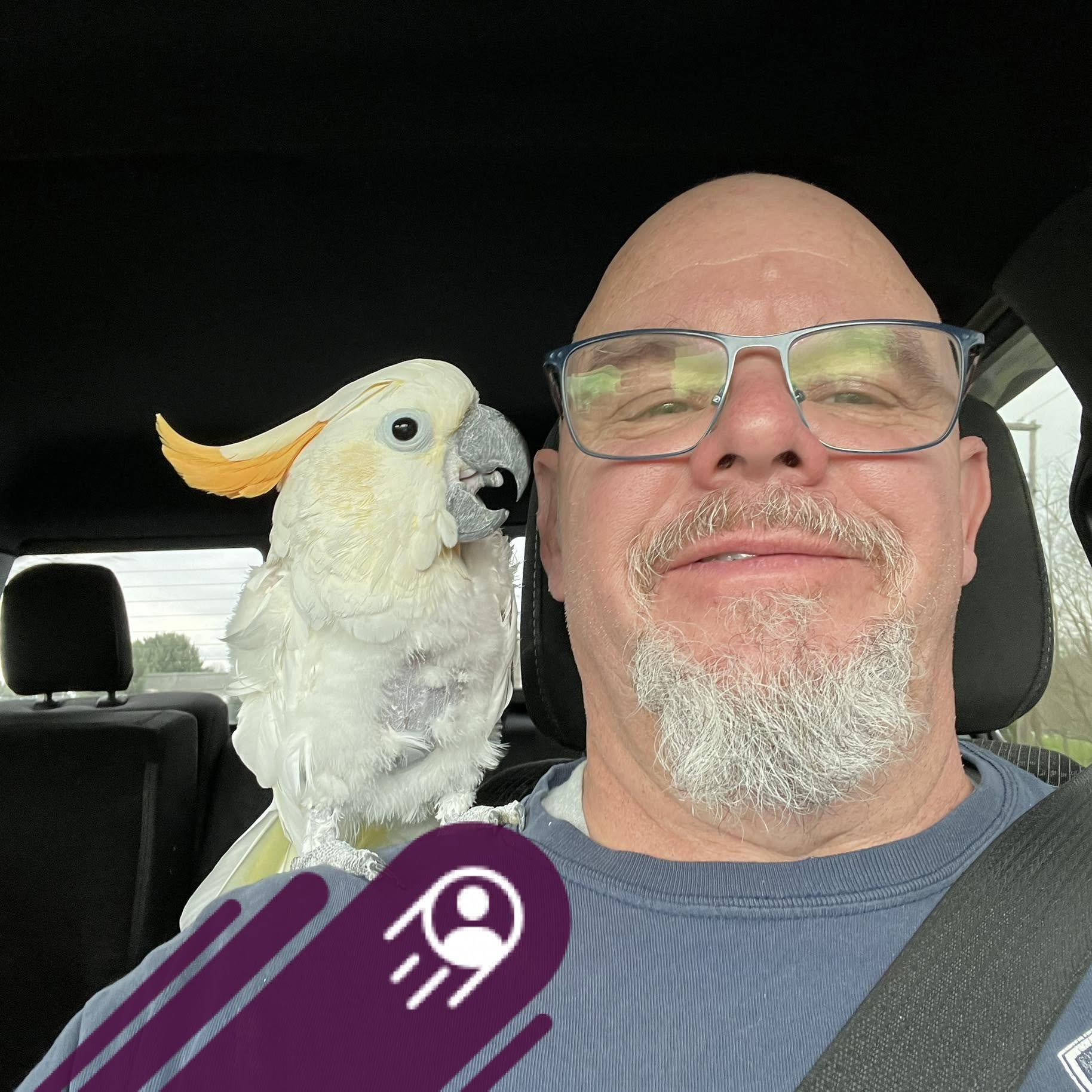 Bunky Jordan, owner of Tumble Services Mobile RV Tech, with his cockatoo