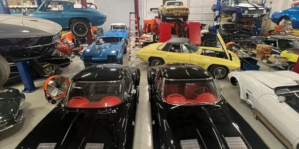 Classic cars inside Aftermath Hot Rods workshop