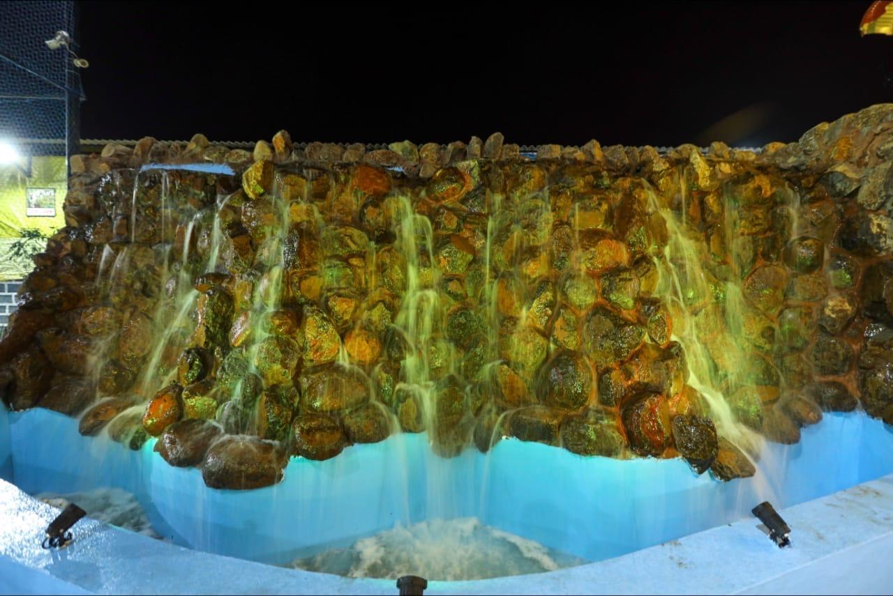 Illuminated stone waterfall